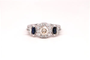 Custom 5 stone sapphire and diamond engagement ring